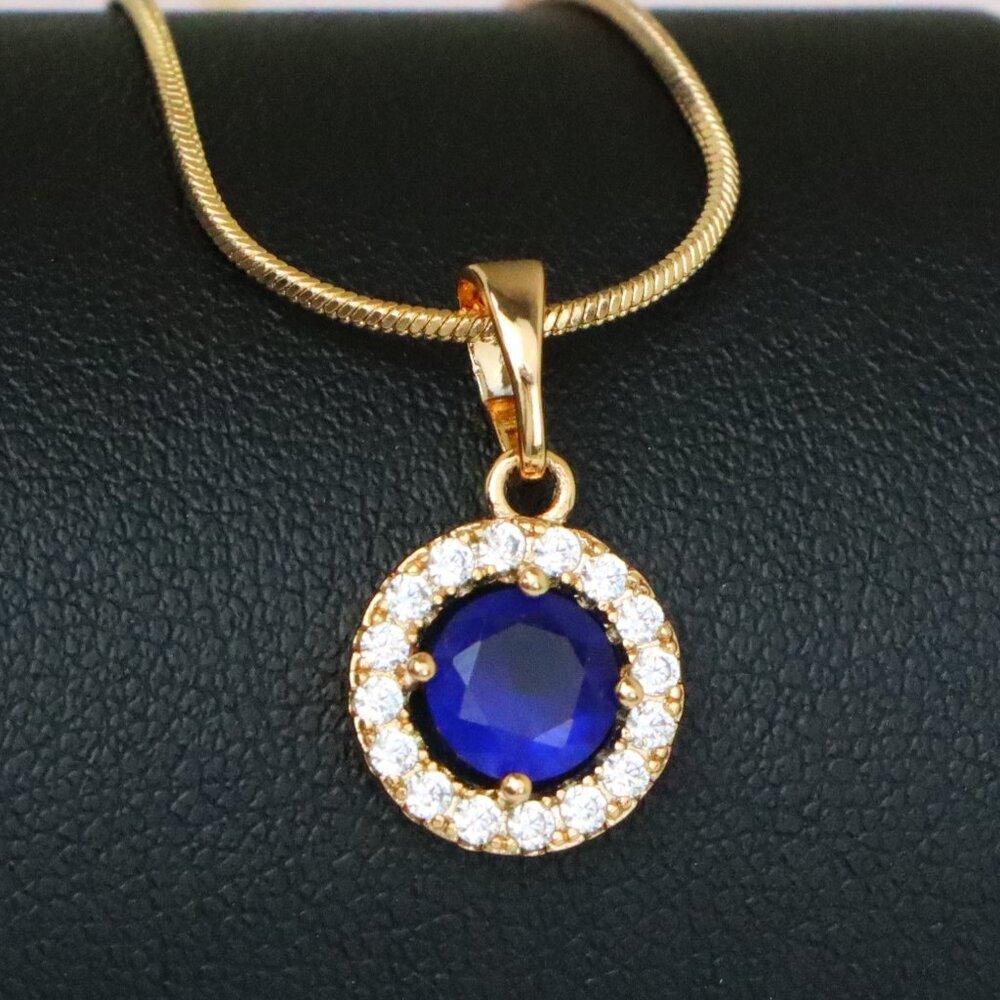 "Rose Gold Round Pendant with Blue Center Stone and White Halo, XPPT1873